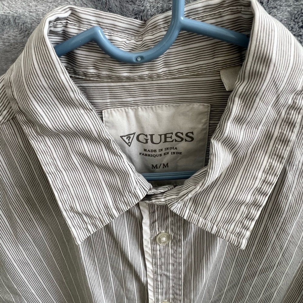 gray and white short sleeve Guess button down shirt